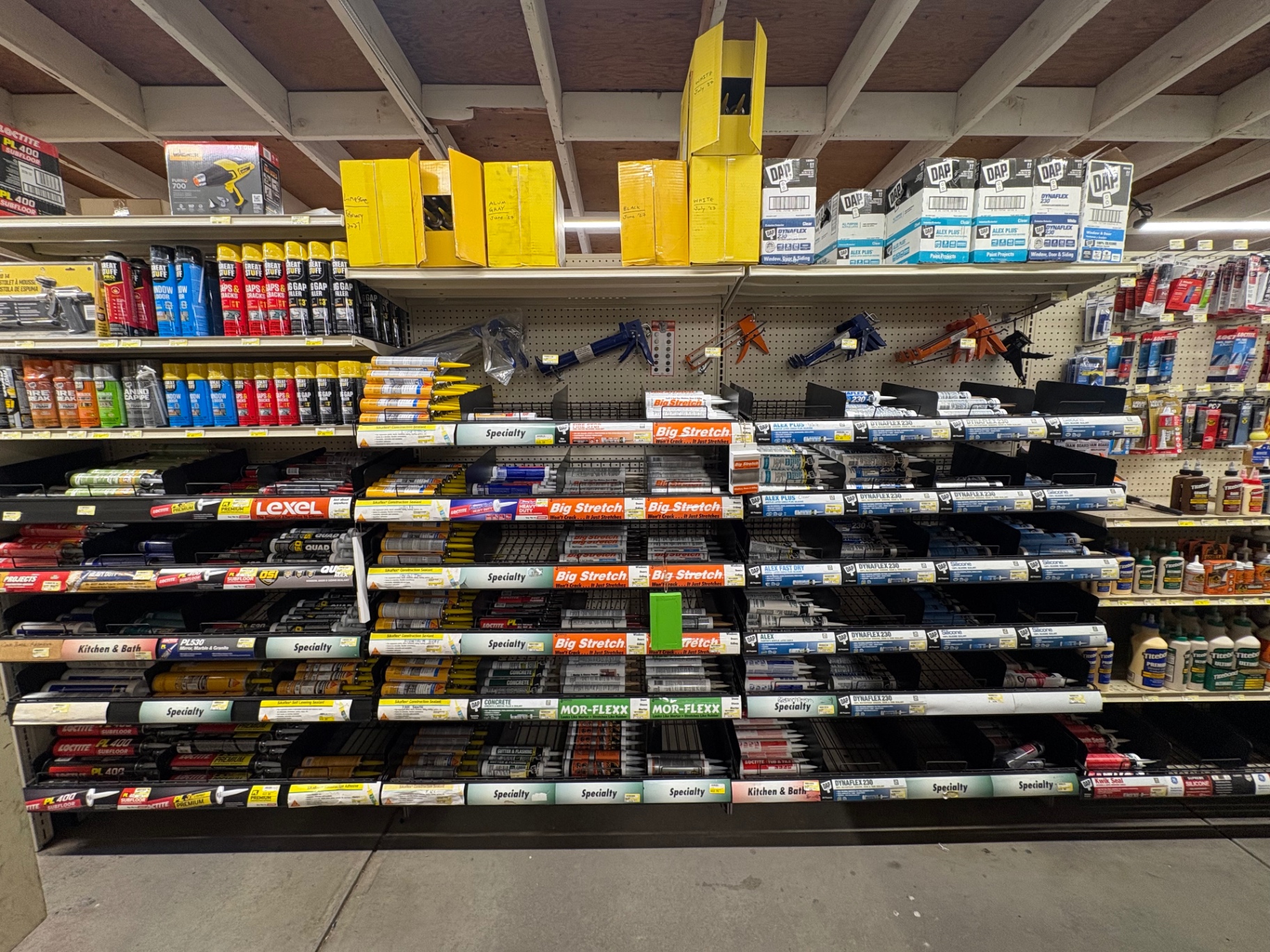 Caulk, adhesives, and sealants aisle